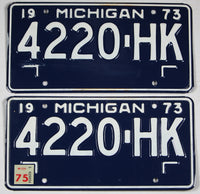 A pair of New Old Stock 1975 Michigan Commercial License Plates for sale by Brandywine General Store in excellent condition