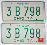 A classic pair of 1975 Ohio truck license plates for sale by Brandywine General Store in excellent minus condition with minor bending