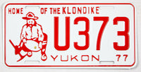 A 1977 Yukon passenger car license plate for sale at Brandywine General Store in near mint condition