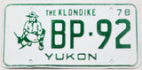 A 1978 Yukon passenger car license plate for sale at Brandywine General Store in very good plus condition with bends