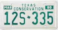 Vintage Texas Conservation license plate from March 1980 with green text on a white background.