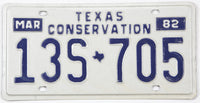 Vintage Texas conservation license plate from March 1982 with blue text on a white background