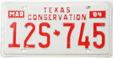 Texas Conservation license plate from March 1984 with red text on a white background