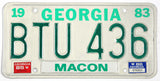 A vintage 1986 Georgia passenger automobile license plate for sale by Brandywine General Store from Macon county GA