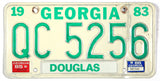 A vintage 1986 Georgia passenger automobile license plate for sale by Brandywine General Store from Douglas county GA