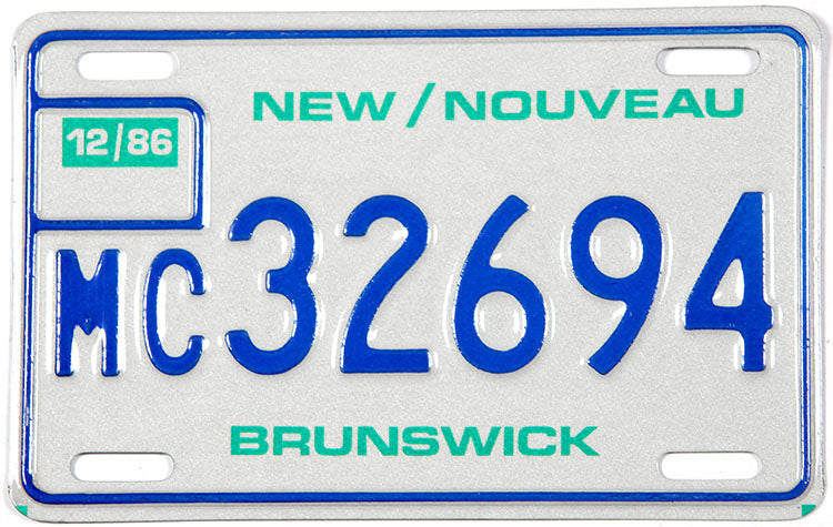 Classic 1986 New Brunswick motorcycle license plate grading excellent plus