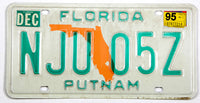 A 1995 Florida passenger car license plate for sale by Brandywine General Store in very good plus condition with discoloring