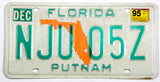 A 1995 Florida passenger car license plate for sale by Brandywine General Store in very good plus condition with discoloring