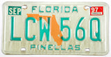 A 1997 Florida passenger car license plate in very good plus condition with some discoloring