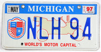 A 1997 Michigan World's Motor Capital car license plate for sale by Brandywine General Store in excellent condition