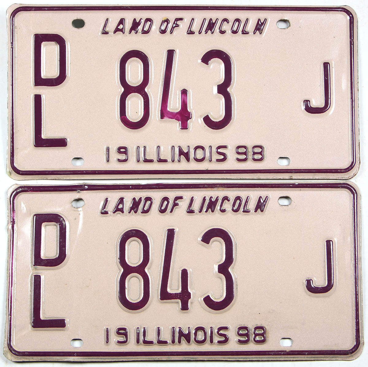 Classic 1998 Illinois dealer license plates grading very good plus with bends on one plate