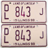 Classic 1998 Illinois dealer license plates grading very good plus with bends on one plate