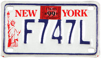 classic 1999 New York motorcycle license plate in excellent condition