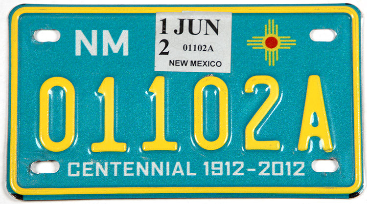 2012 New Mexico Centennial motorcycle license plate grading excellent
