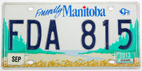 A 2013 Manitoba Canada passenger car license plate for sale at Brandywine General Store in excellent minus condition
