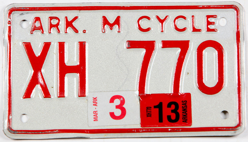 Classic 2013 Arkansas motorcycle license plate grading very good plus with some bends