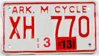 Classic 2013 Arkansas motorcycle license plate grading very good plus with some bends