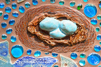 An original premium quality art print of Garden Sculpture with Bird Eggs in Nest for sale by Brandywine General Store