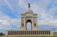An original premium quality art print of Pennsylvania Monument with Swirling Sky in Gettysburg Military Park for sale by Brandywine General Store
