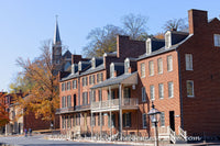 An original premium quality art print of Shenandoah Street with Bicyclists in Harpers Ferry Historical National Park for sale by Brandywine General Store