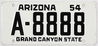 Vintage Arizona Wheaties toy license plate from 1954 with the text 'Grand Canyon State'.