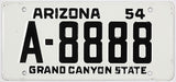 Vintage Arizona Wheaties toy license plate from 1954 with the text 'Grand Canyon State'.