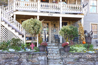 art print of Mountain State business porch decorated for fall in Harpers Ferry WV