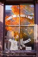 art print of autumn tree and civil war clothing in Harpers Ferry store window