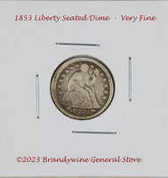An 1853 Liberty Seated dime with arrows in very fine condition