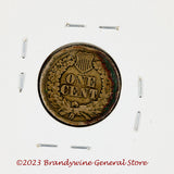 An 1863 Indian Head Penny in good condition reverse side