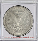 An 1885 Morgan Silver Dollar in average circulated plus condition reverse side