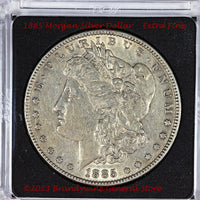 An 1885 Morgan Silver Dollar in average circulated plus condition