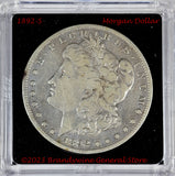 An 1892-S Morgan better date Silver Dollar in average circulated condition