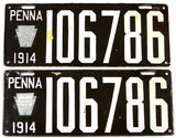An Antique porcelain pair of 1914 Pennsylvania passenger car license plates for sale at Brandywine General Store in very good plus condition with the keystone tabs