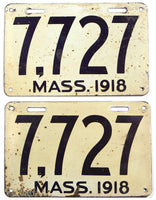 An antique pair of 1918 passenger car license plates in very good condition