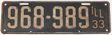 An antique 1933 Illinois passenger car license plate in very good condition with 2 extra holes