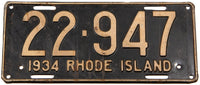 An antique 1934 Rhode Island car license plate in very good condition with 2 extra holes