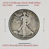A 1938-D Walking Liberty Half Dollar in fine condition and a key coin to the series