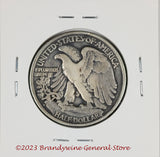 A 1938-D Walking Liberty Half Dollar in fine condition and a key coin to the series Reverse side