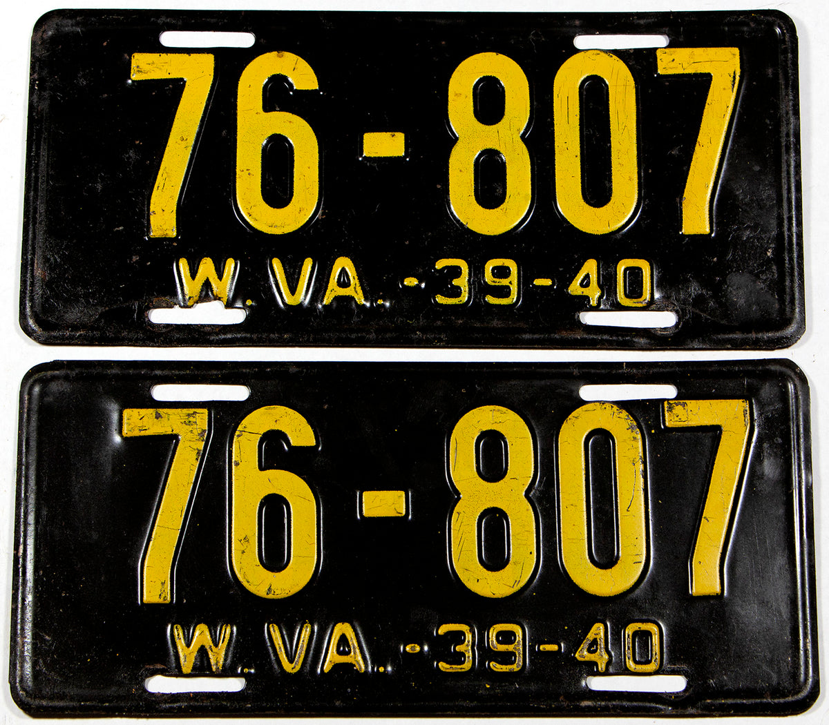 A pair of antique 1939 - 1940 West Virginia car license plates in very good condition