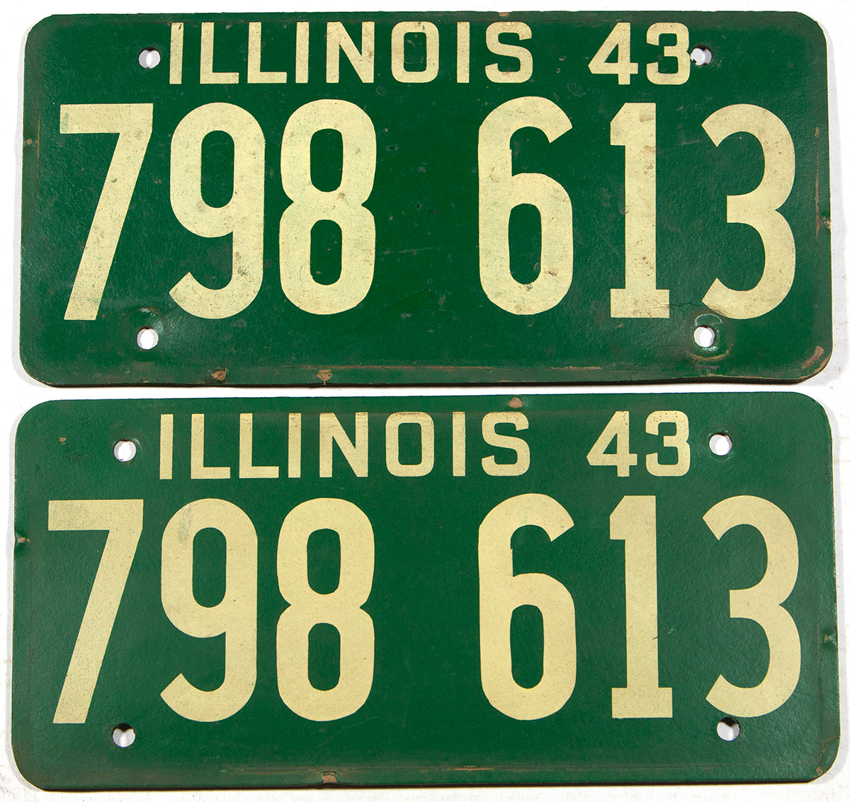 An antique World War II pair of 1943 Illinois car license plate in very good condition