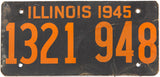 A 1945 WWII Illinois Car license plate made of fiber board in very good condition with a break