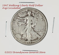 A 1947=D Walking Liberty Half Dollar in very good condition
