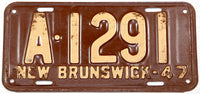An antique 1947 New Brunswick commercial 1/4 year license plate in very good condition