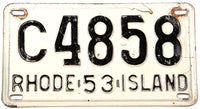 A classic 1953 Rhode Island passenger car license plate in very good condition