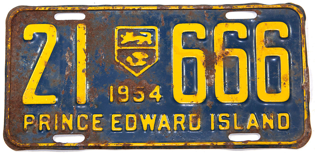An antique 1954 passenger car license plate from the Canadian province of Prince Edward Island in good plus condition