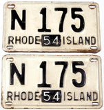 An antique pair of 1954 Rhode Island car license plates in very good condition