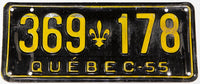 A vintage 1955 Quebec passenger car license plate in very good condition