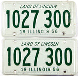A pair of 1956 Illinois car license plates in very good condition with bends and scratches