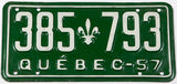 A classic 1957 Quebec passenger car license plate in excellent minus condition